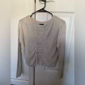 Long sleeve shirt with super cute back detail!